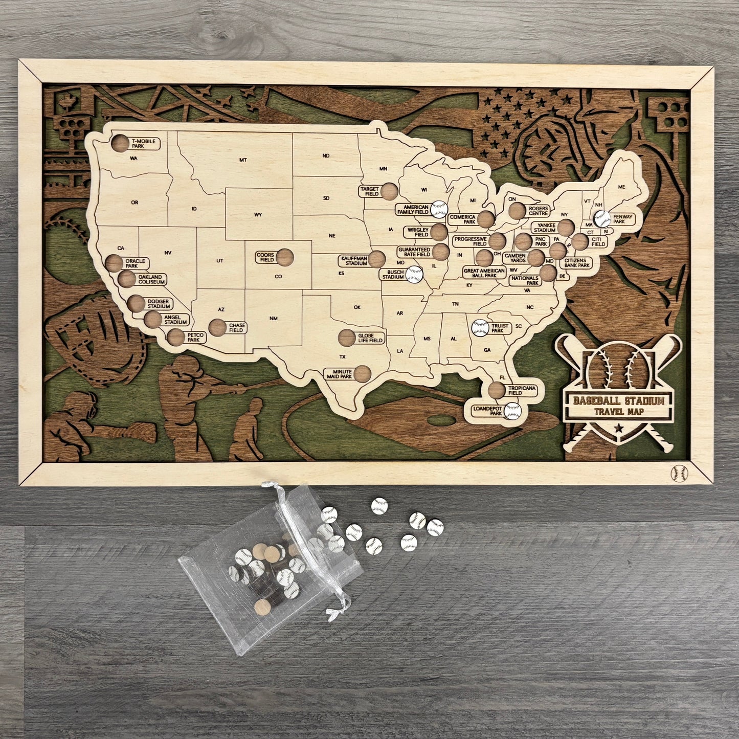 Wooden map of baseball stadiums with baseball tokens.