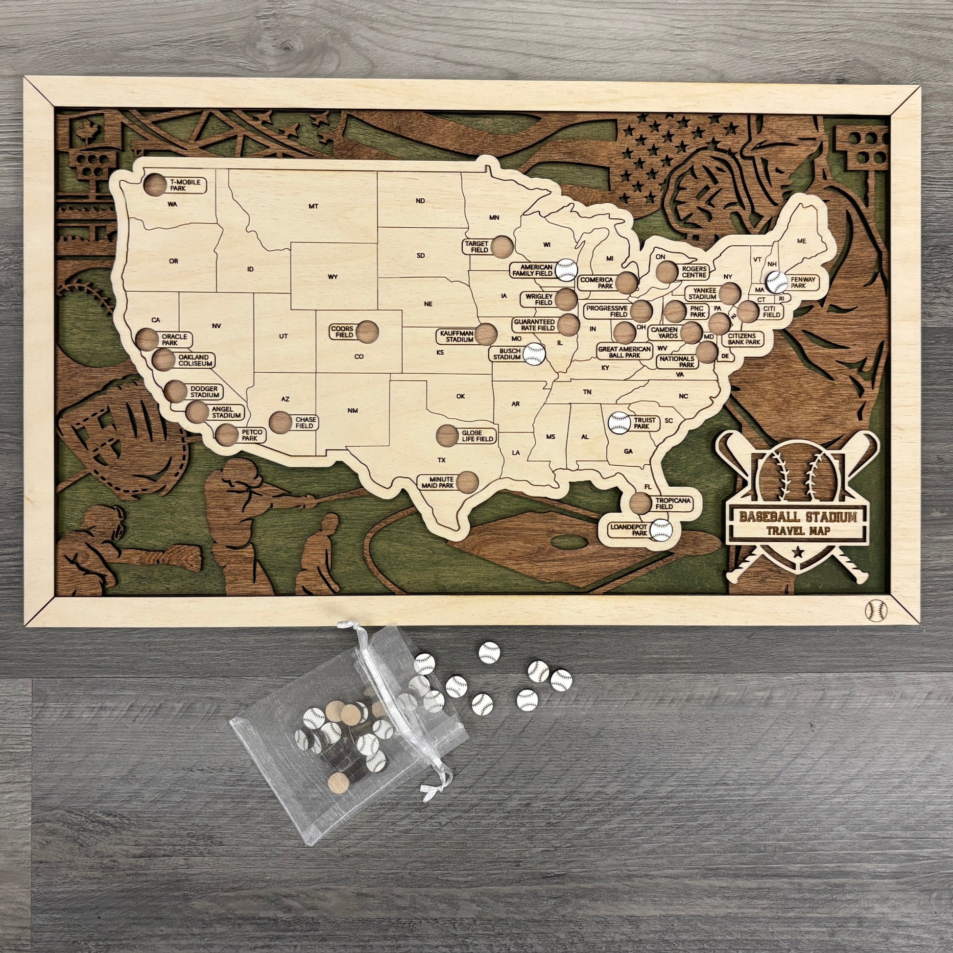Wooden map of baseball stadiums with baseball tokens.