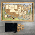 Wooden map of the United States with wooden pieces on a wooden surface