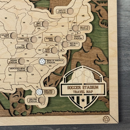 Wooden map of a soccer stadium with detailed design on a wooden surface